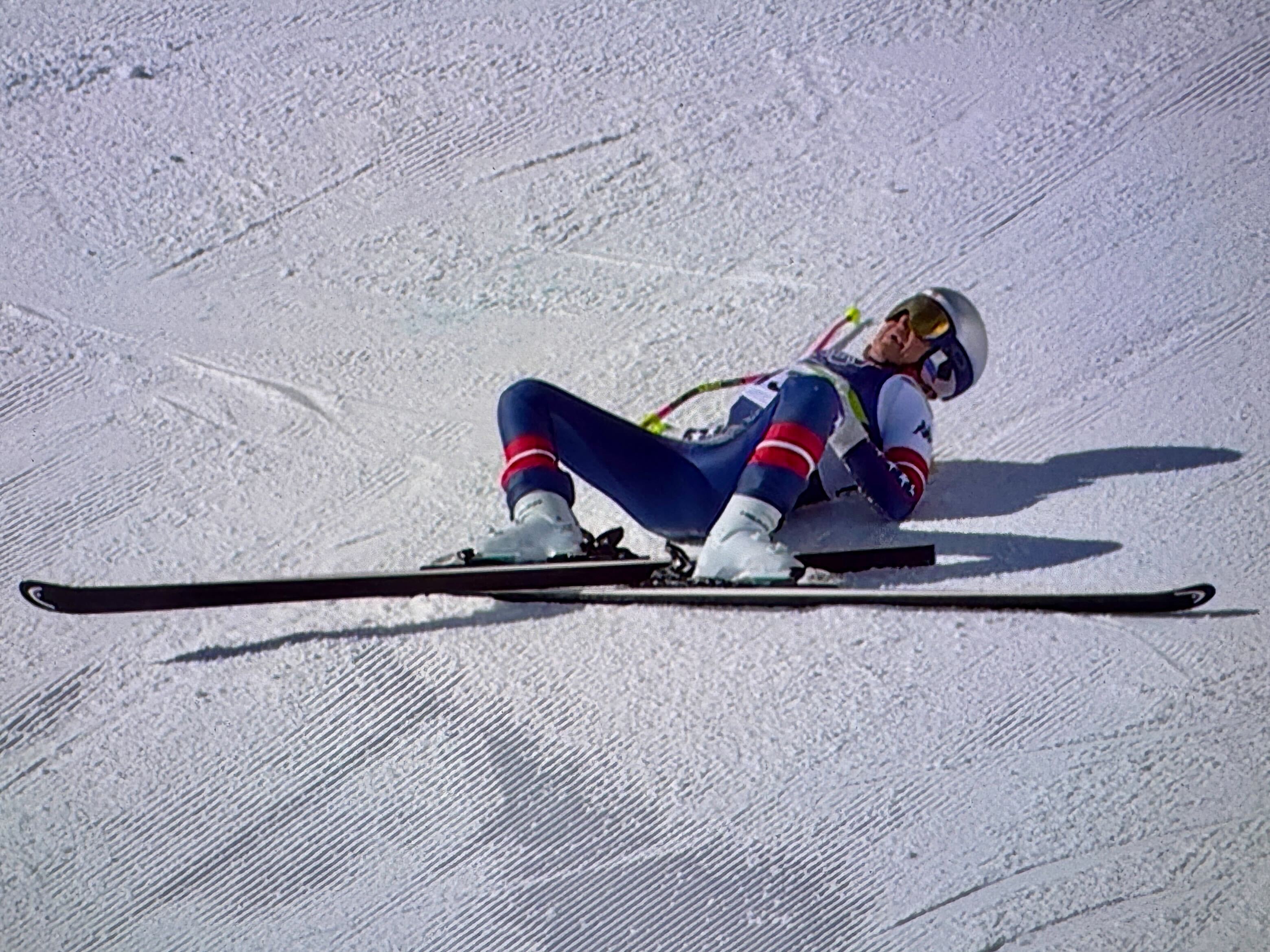 caption: Lindsey Vonn of Team United States crashes during the Women's Downhill Saturday at the Winter Olympics in Cortina d'Ampezzo, Italy.