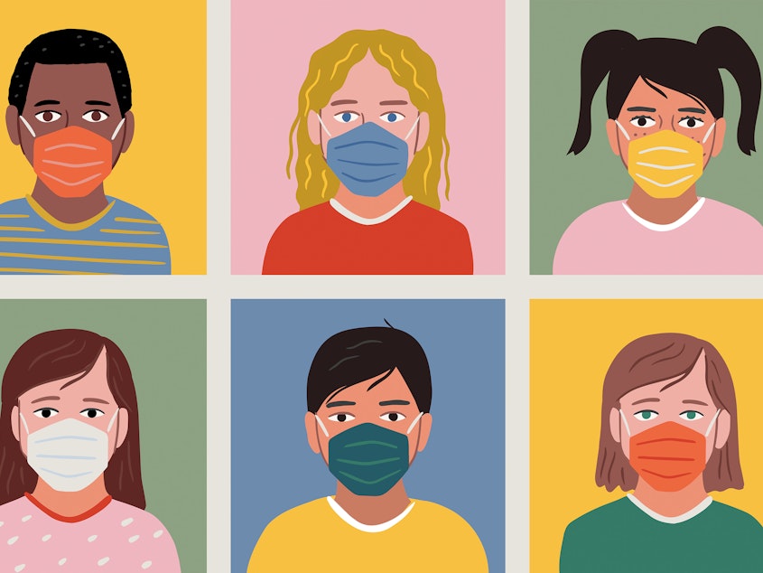 Diverse set of child portrait avatars wearing face masks.