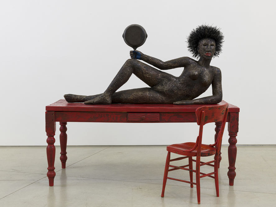 caption: "She's challenging you to sit down in that chair," Los Angeles artist Alison Saar says of her 2019 sculpture,<em> Set to Simmer.</em>