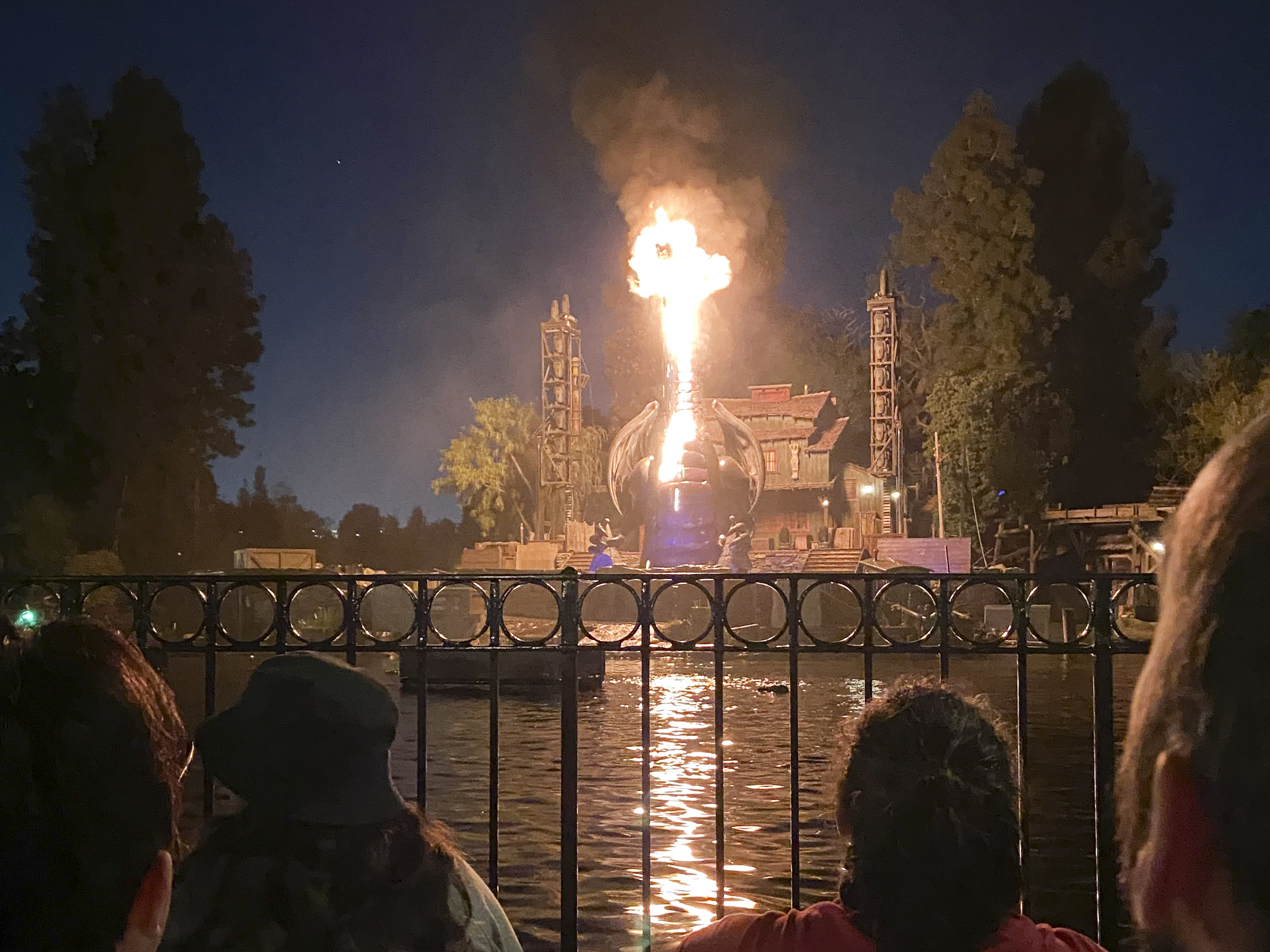 caption: This photo courtesy of Shawna Bell shows a fire during the "Fantasmic" show in the Tom Sawyer Island section of Disneyland resort in Anaheim, Calif., on Saturday, April 22, 2023.