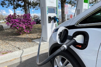 caption: Filling up on climate-friendly hydropower in April 2023 at an Electrify America charging station in Yakima, Washington.