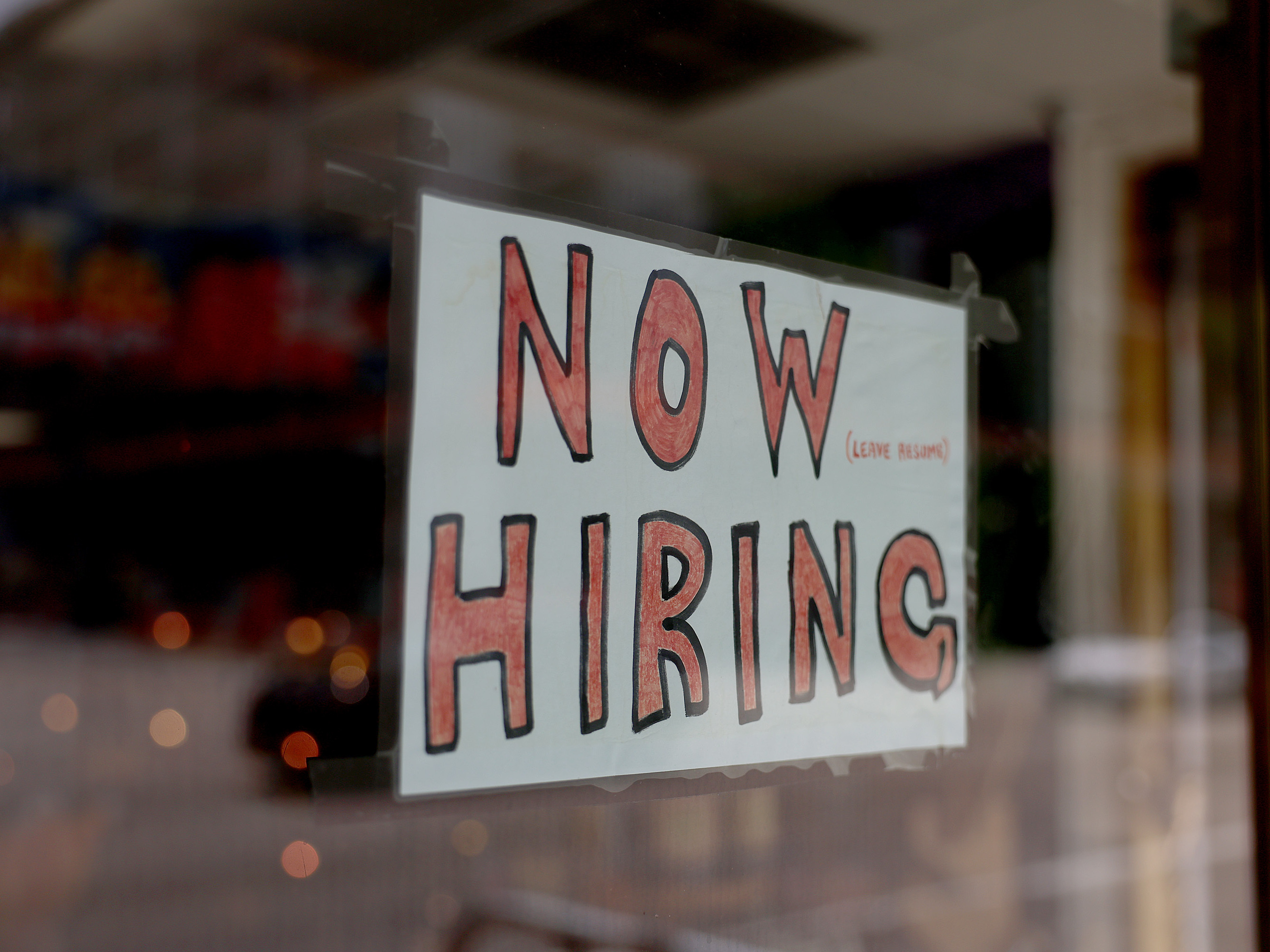 caption: A Biden proposal would raise the threshold under which salaried workers are eligible for overtime pay — but it could face opposition from business groups.