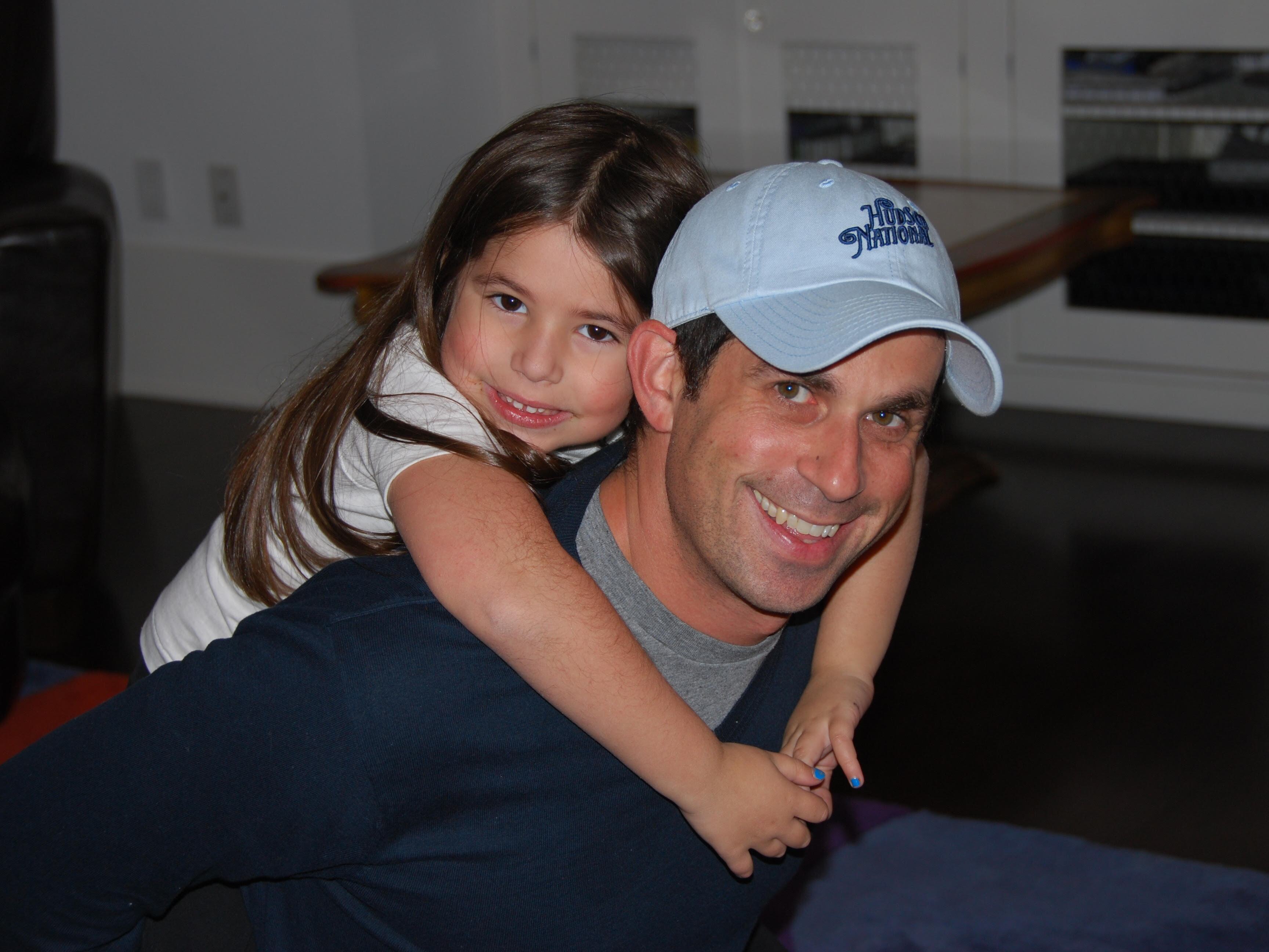 caption: Ian Sandler and his daughter, Riley Sandler.