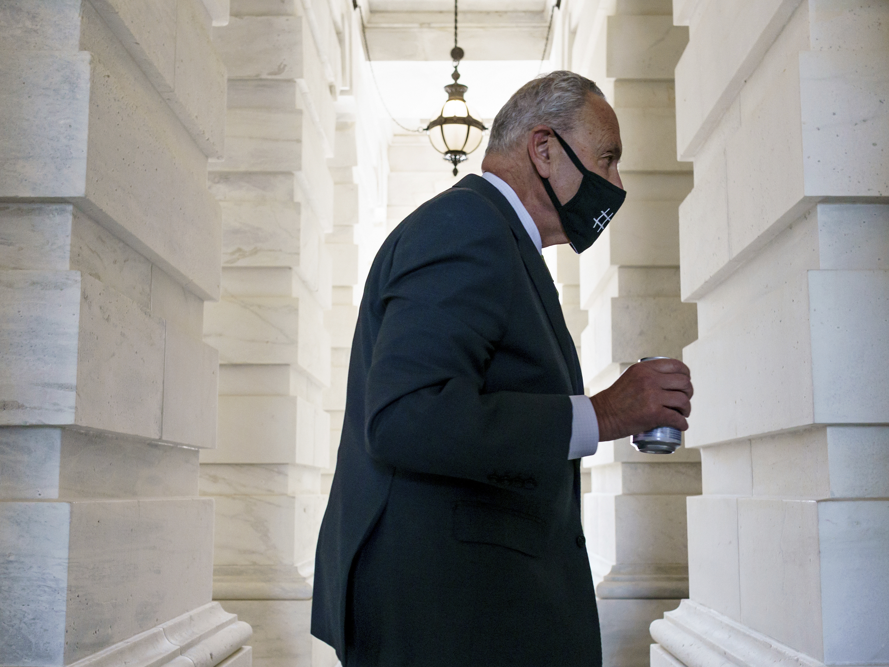 caption: Senate Majority Leader Chuck Schumer, D-N.Y., unveiled the text of a $3.5 trillion budget framework.