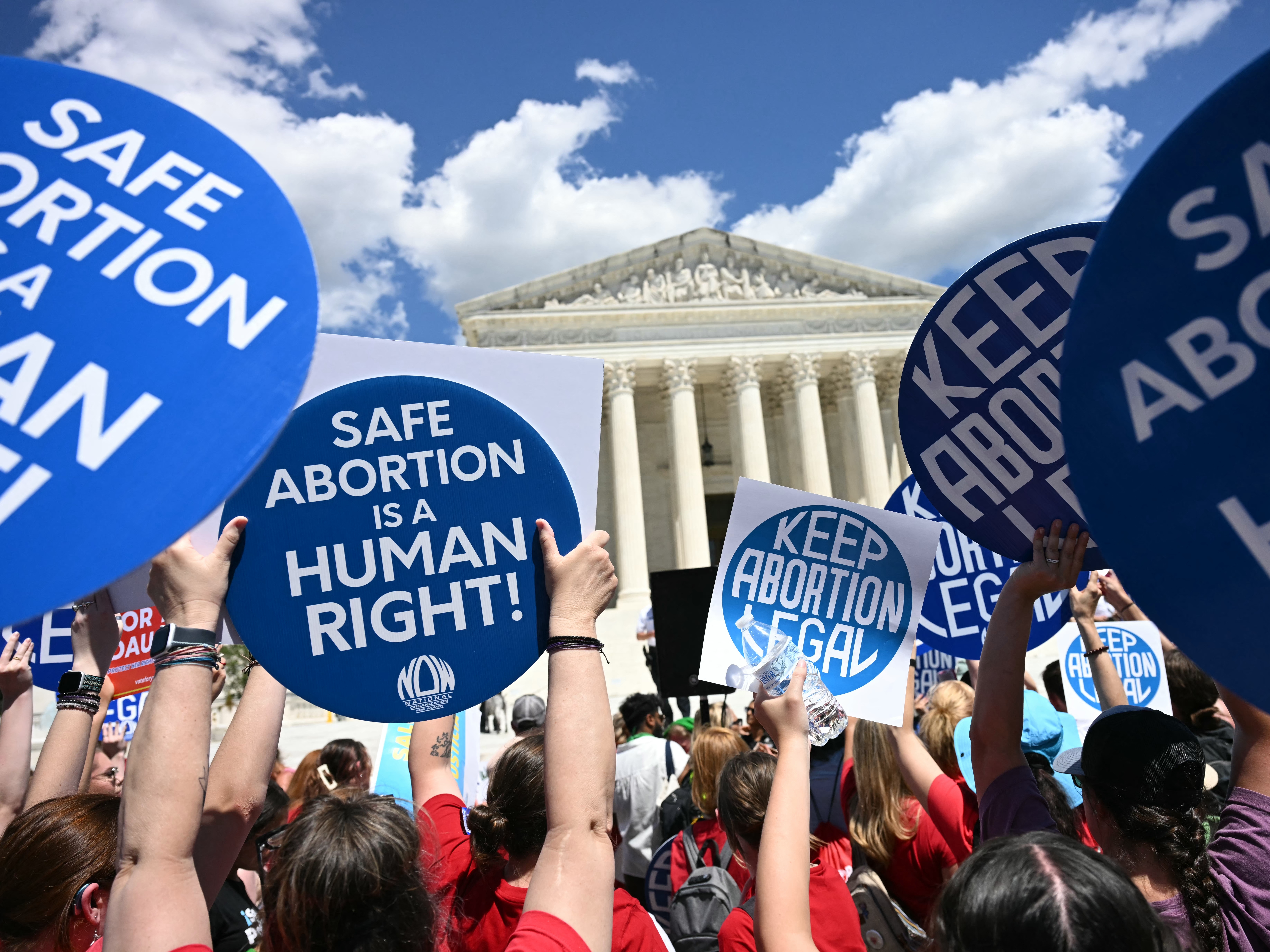 caption: Reproductive rights activists demonstrated in front of the Supreme Court in Washington, D.C. on Monday. 