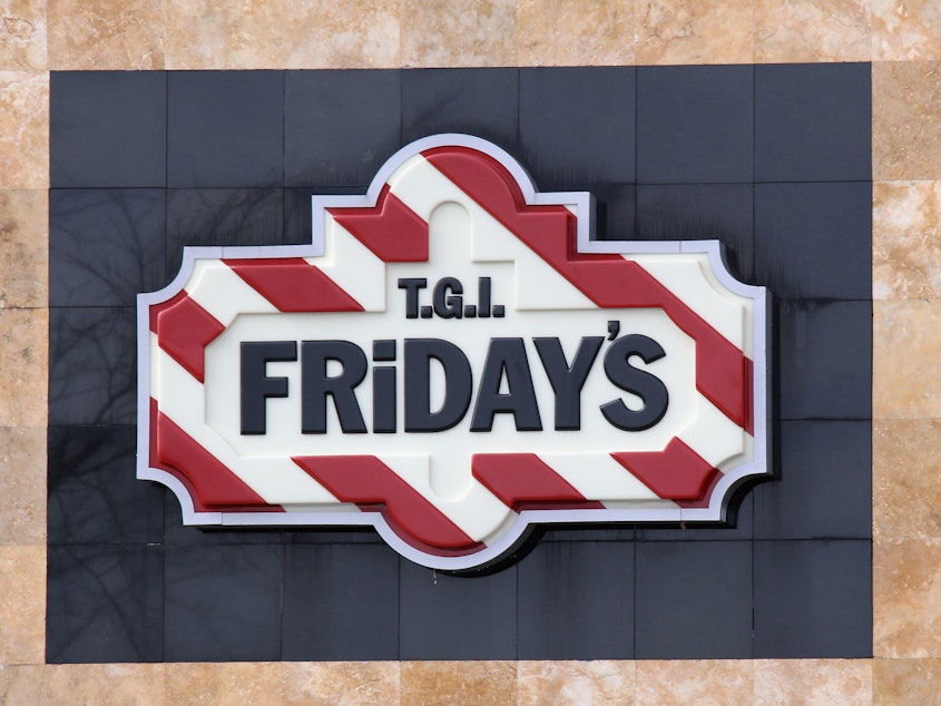 caption: An image of the sign for T.G.I Friday's as photographed on March 16, 2020 in Levittown, New York.