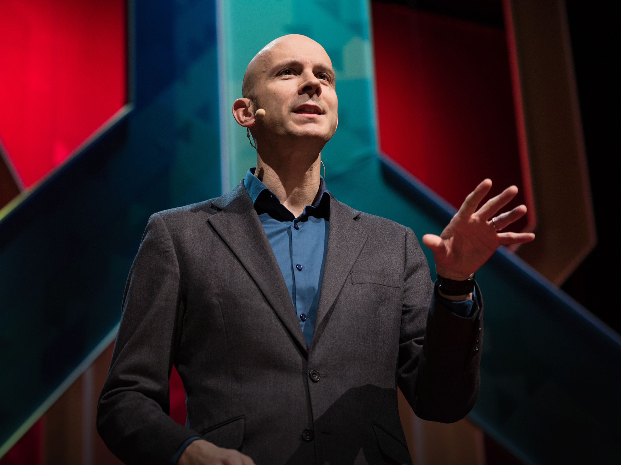 caption: Tim Harford on the TED stage.