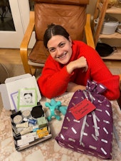 caption: Seattle preschool teacher Toni Ray with her gift ready to go.