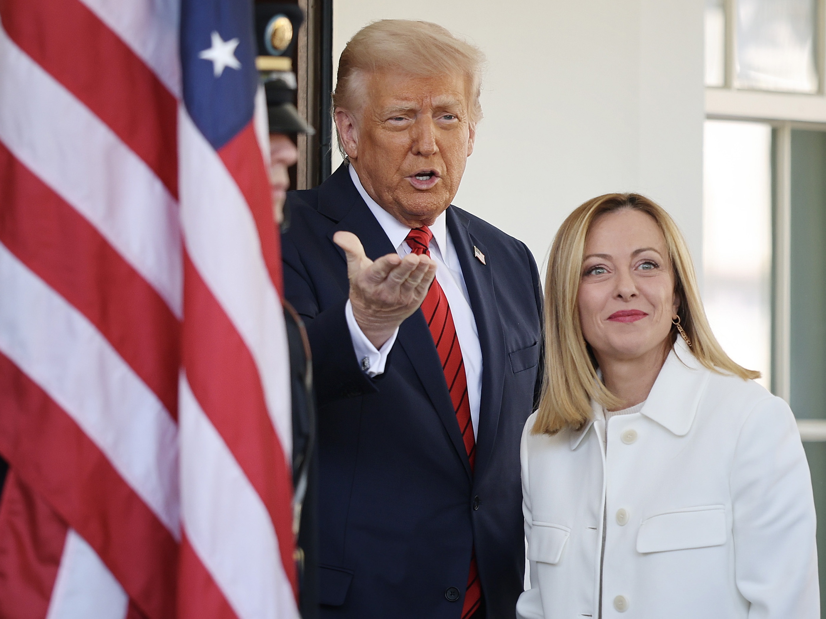 caption: President Trump greets Italian Prime Minister Giorgia Meloni outside the West Wing of the White House on April 17. Meloni has been called a "Trump whisperer" who could bridge the gap between the U.S. president and European leaders.