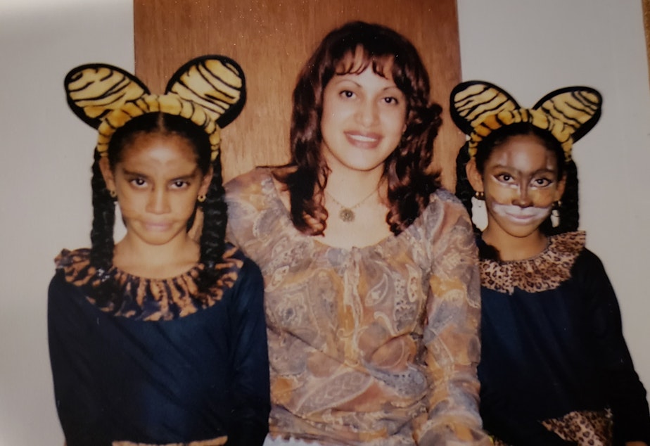 caption: Liz Garcia and her daughters on Halloween circa 2001 or 2002. The photo was taken in the apartment where Garcia was raped a few years later. 