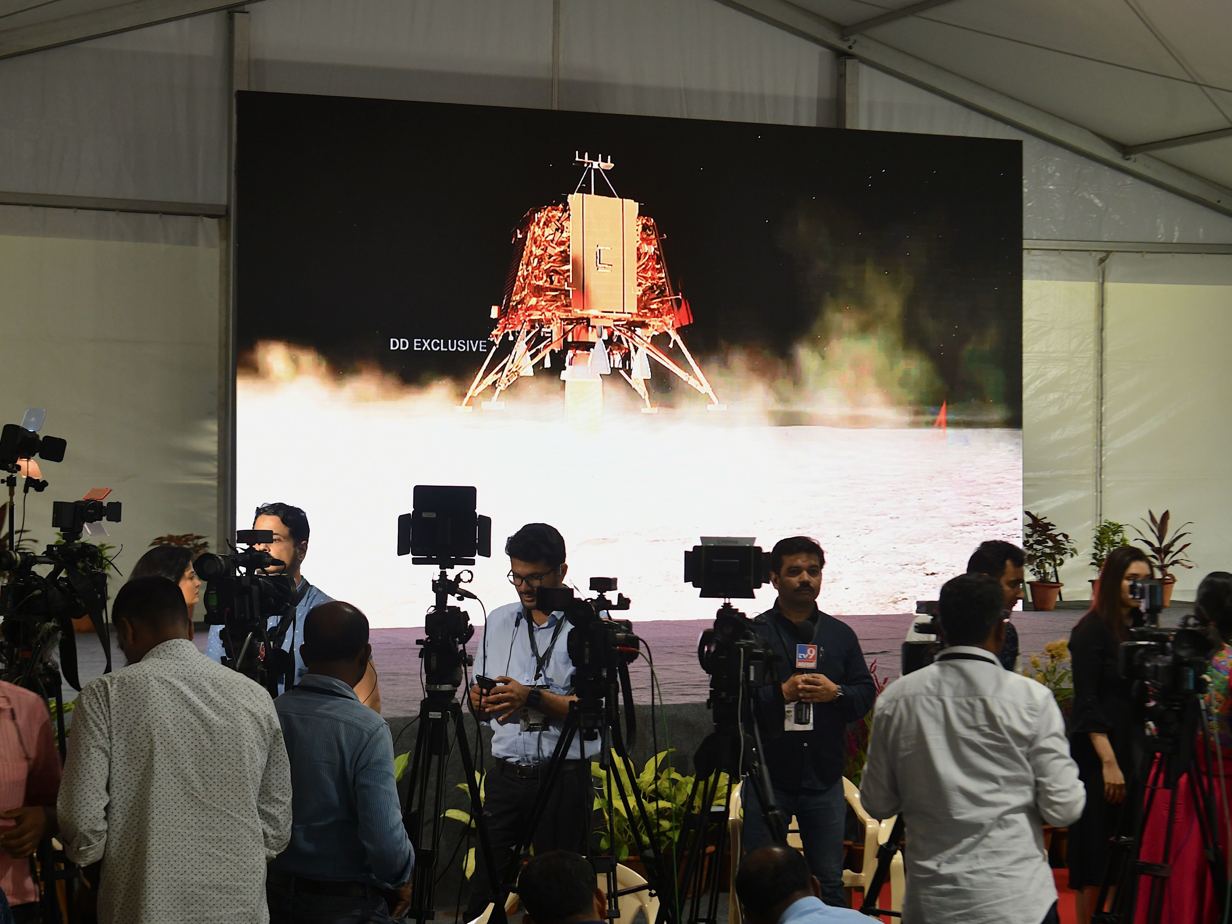caption: The India media covers the launch of the solar-powered rover Chandrayaan-2 in September. The goal was a moon landing, but the craft crashed. Another attempt to send a rover to the moon is underway.