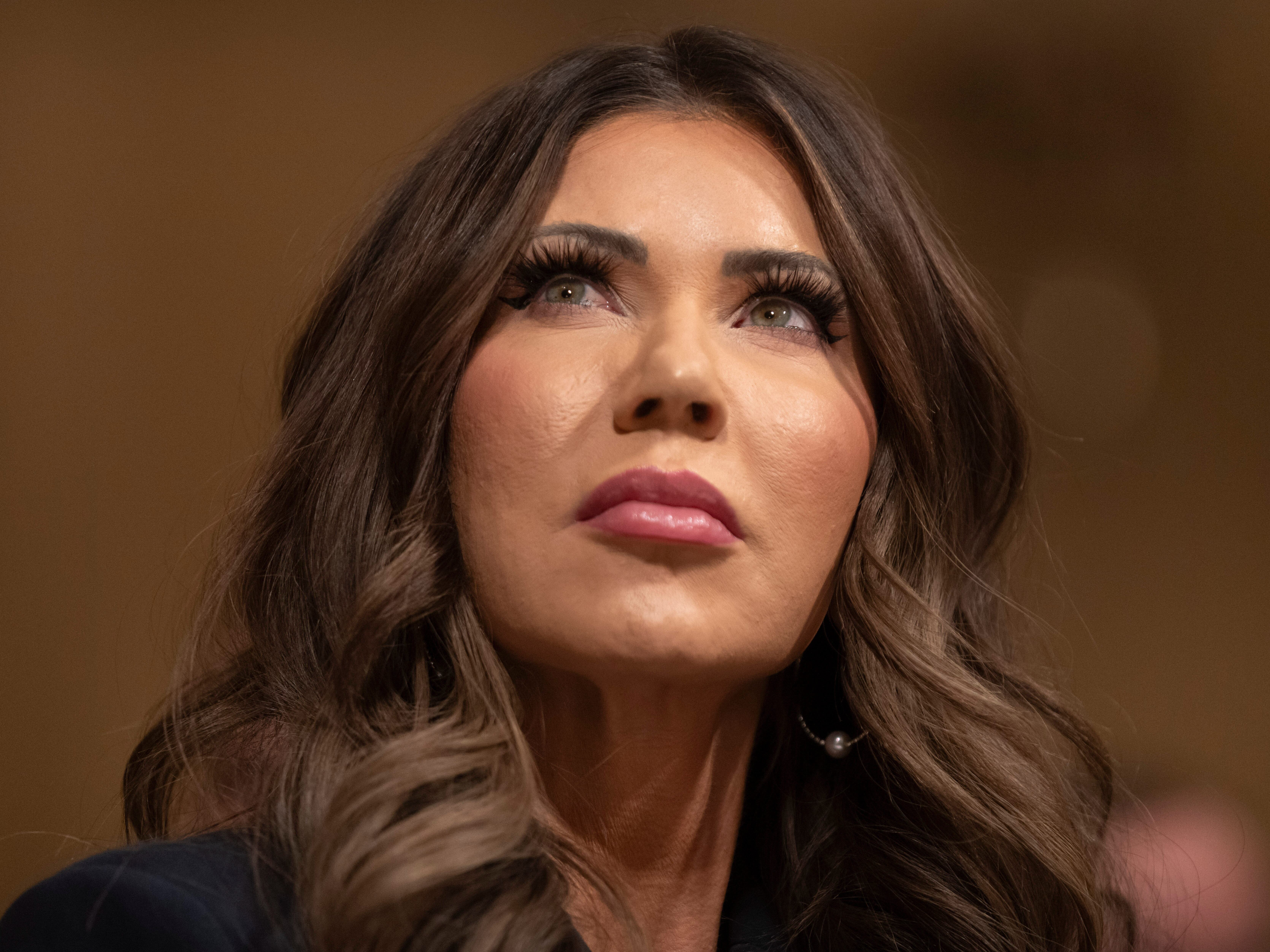 caption: Homeland Security Secretary Kristi Noem appears before the House Committee on Homeland Security on Capitol Hill in Washington, Thursday, Dec. 11, 2025.