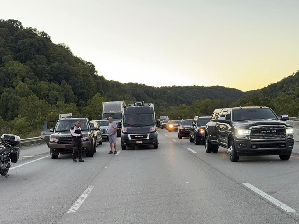 caption: This image released by the Mount Vernon Fire Department shows traffic stopped during an active shooting on Interstate 75 north of London, Ky., on Saturday.