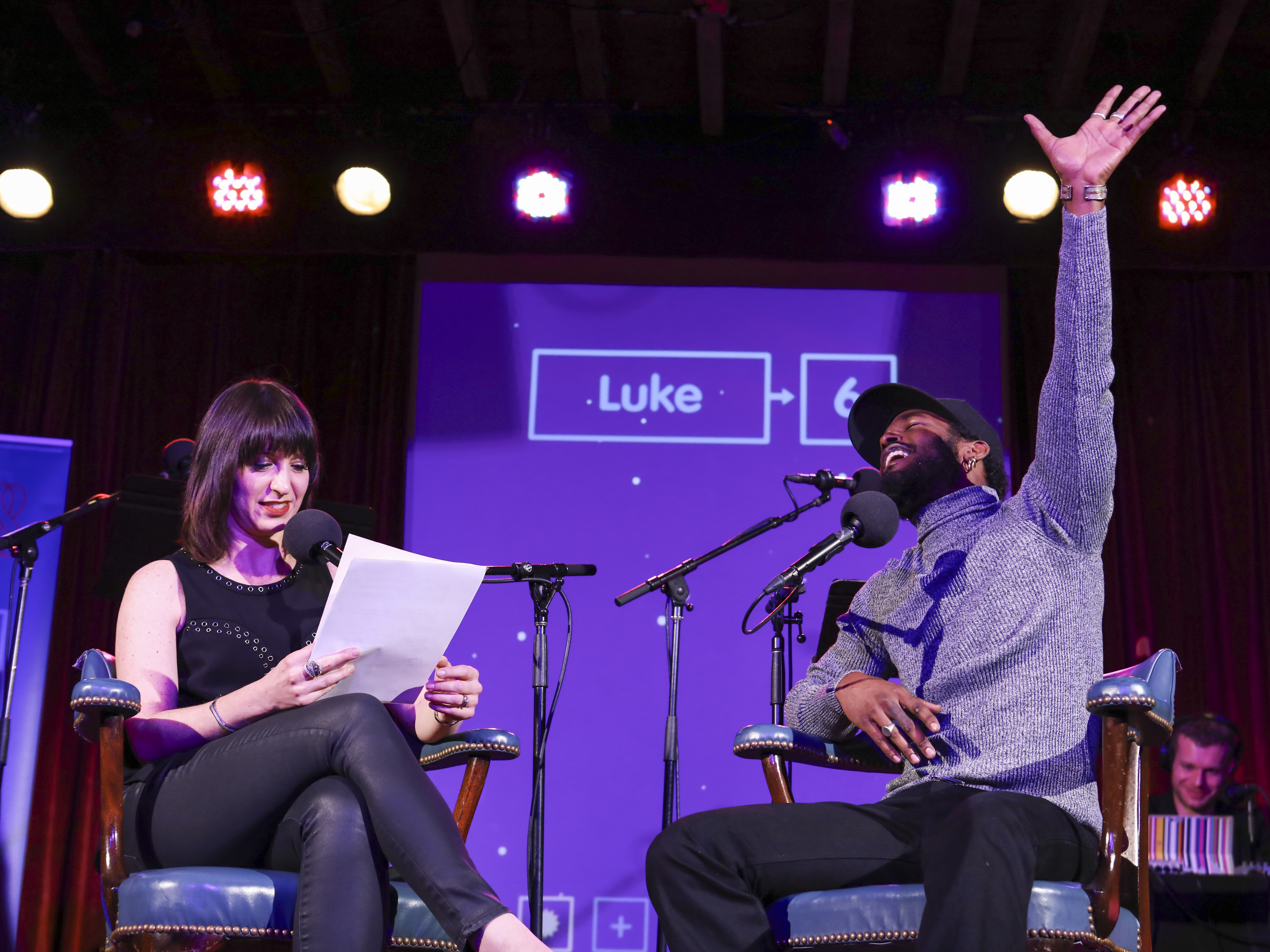 caption: Luke James plays a game on <em>Ask Me Another</em> at the Bell House in Brooklyn, New York.