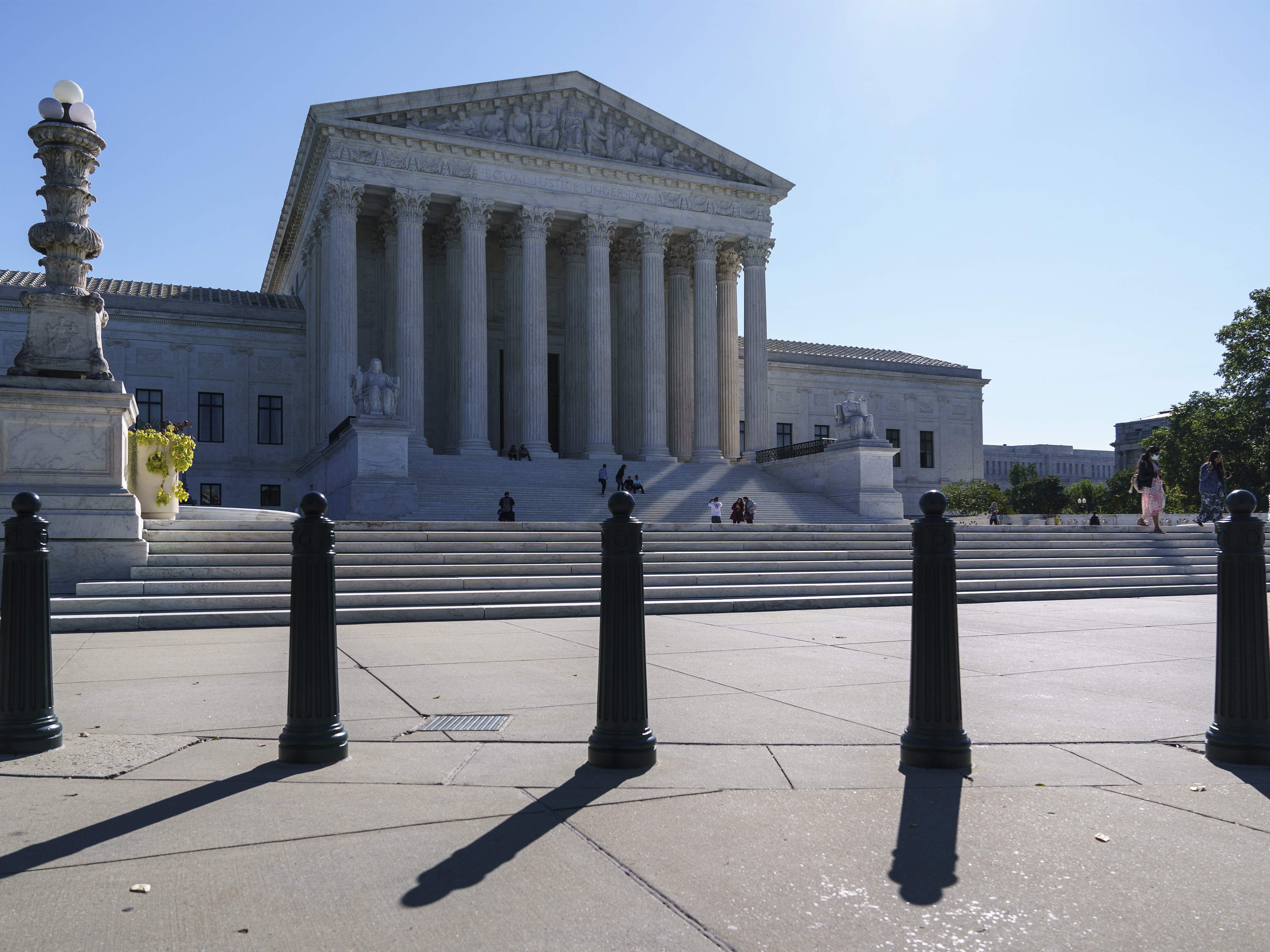 caption: The Supreme Court, which begins its new term Monday, is confronting cases related to the election, the Affordable Care Act and religious rights, among others.