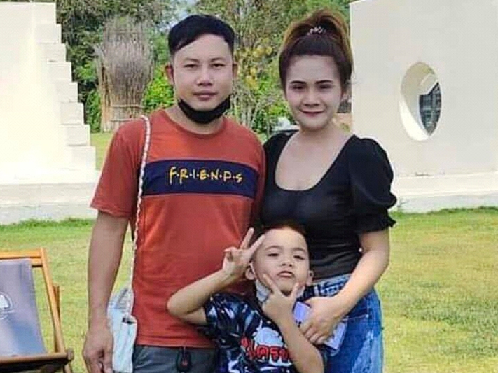 caption: This undated photo provided by the Hostage's Family Forum shows Nattapong Pinta, with his wife and son.
