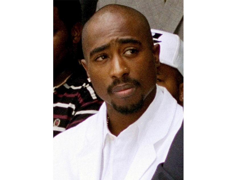 caption: Rapper Tupac Shakur, pictured here in Los Angeles in August 1996, was fatally injured in a drive-by shooting, a case that's never been solved.
