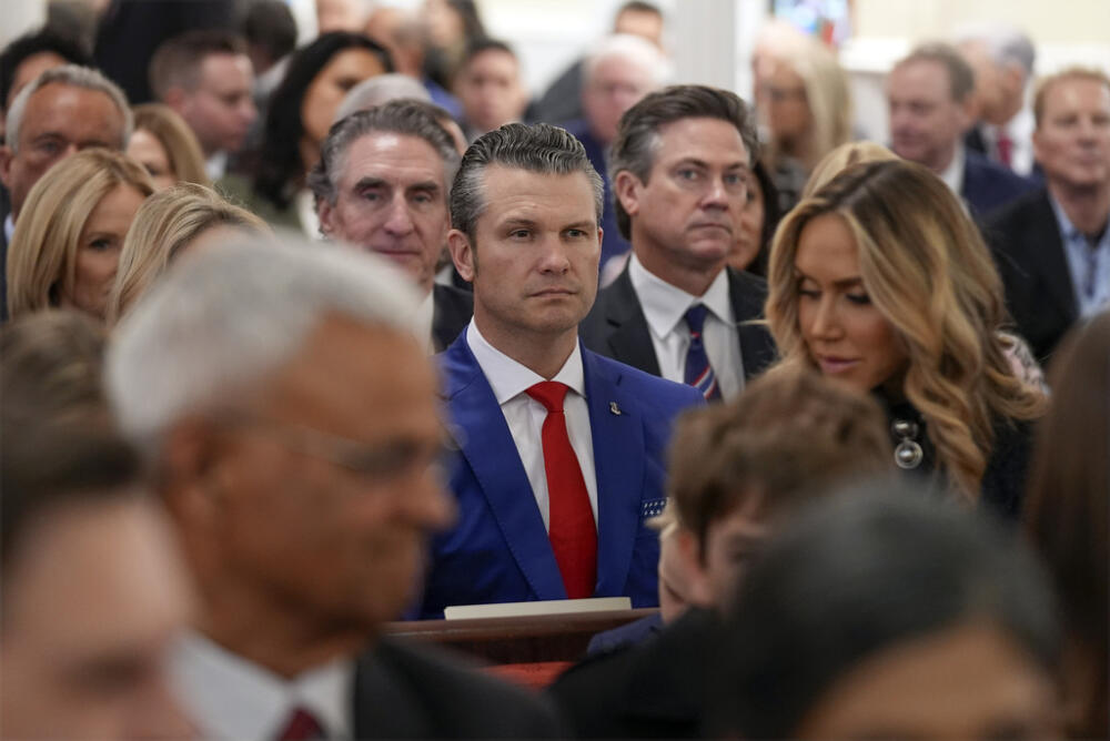 caption: Defense Secretary nominee Pete Hegseth arrives before President-elect Donald Trump at a service at St. John's Church, Monday, Jan. 20, 2025, in Washington, ahead of the 60th Presidential Inauguration. (AP Photo/Evan Vucci)