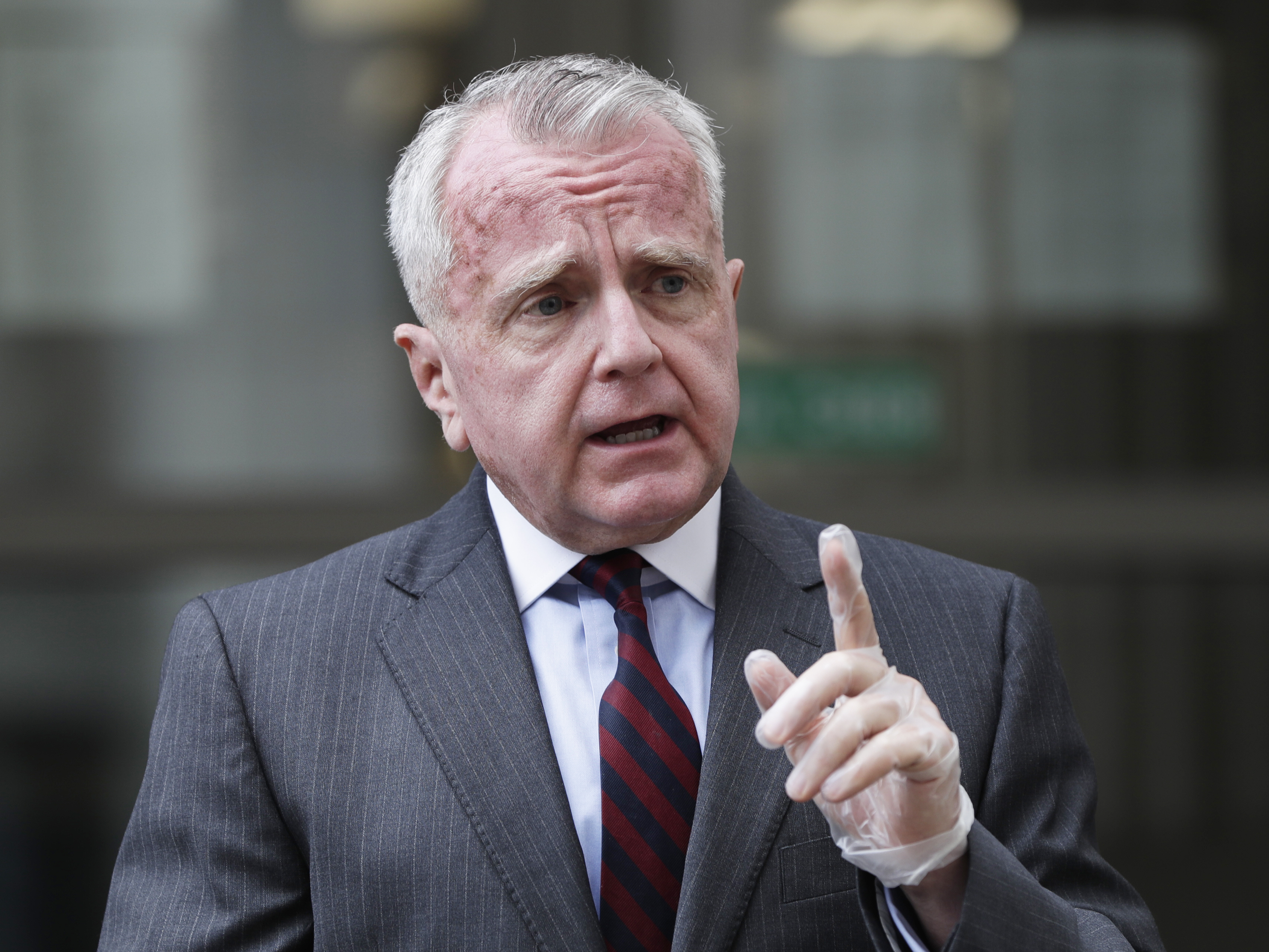 caption: U.S. Ambassador to Russia John Sullivan speaks to the media in Moscow, last year. In a statement on Tuesday, Sullivan said he would return to the U.S. for "consultations" amid deteriorating relations between Washington and Moscow.