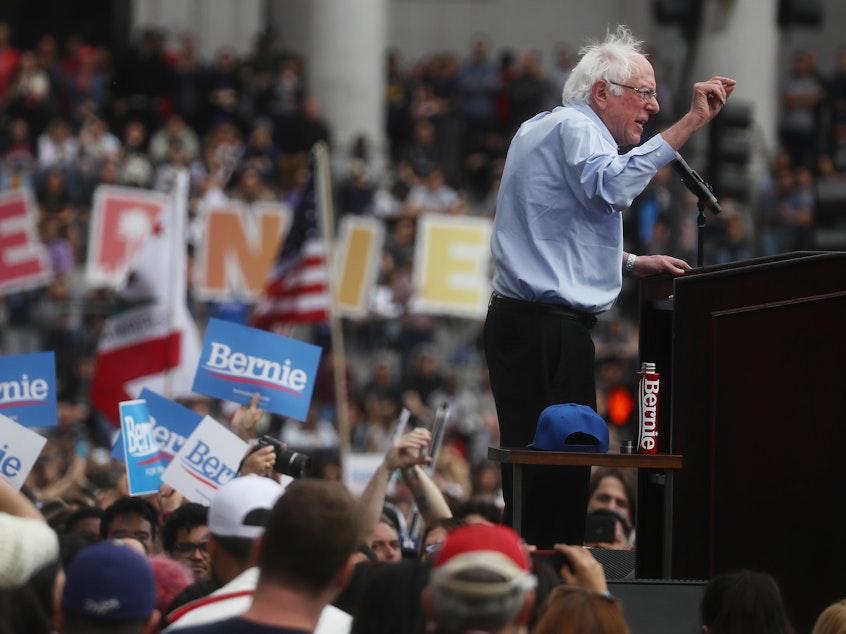 caption: Democratic presidential candidate Sen. Bernie Sanders, I-Vt., speaks at a campaign rally in Los Angeles on March 23. His campaign reported on Tuesday that it raised $18.2 million through the end of the first quarter of the year.