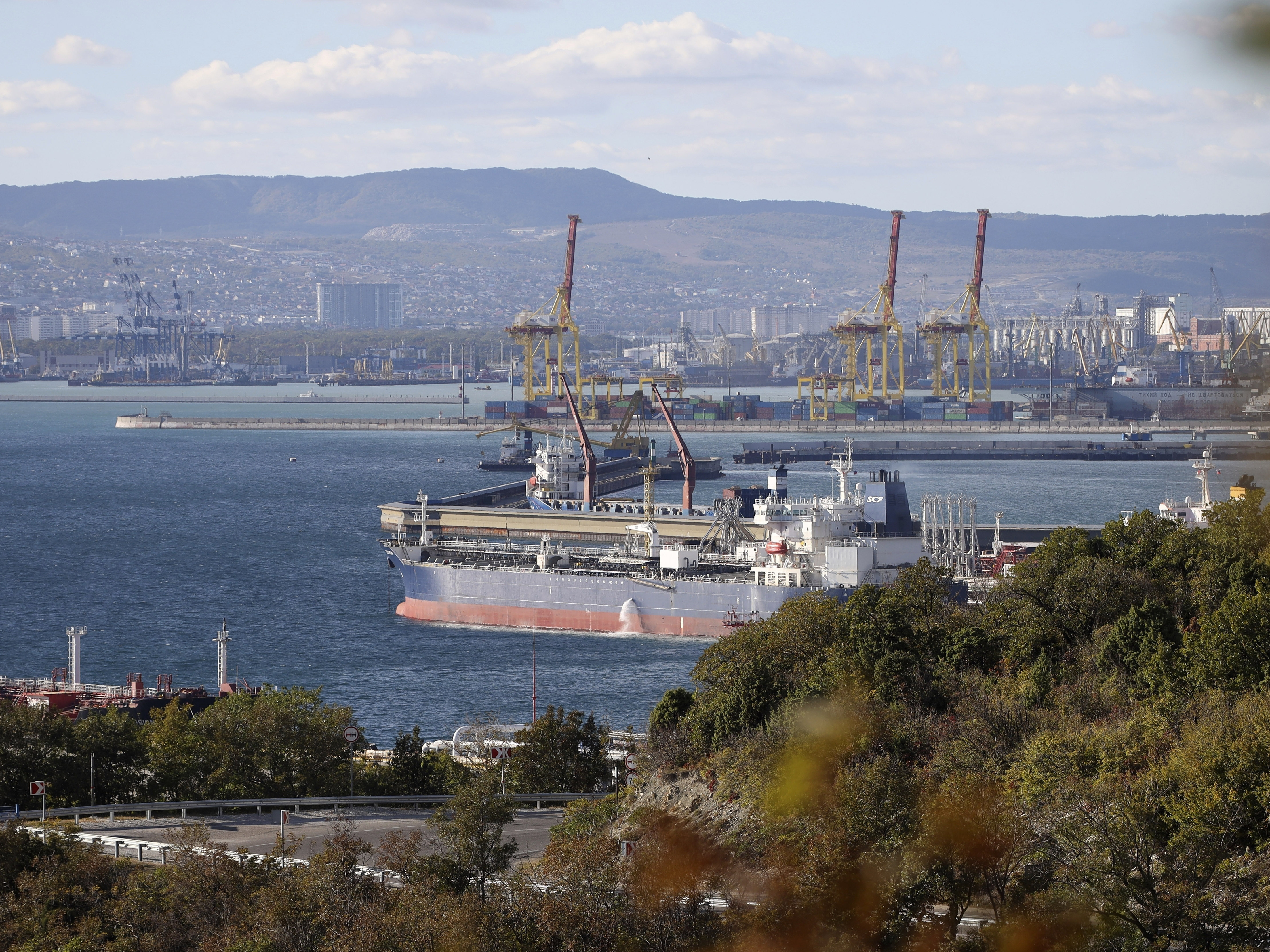 caption: An oil tanker is moored at the Sheskharis complex, part of Chernomortransneft JSC, a subsidiary of Transneft PJSC, in Novorossiysk, Russia, Oct. 11, one of the largest facilities for oil and petroleum products in southern Russia. The deadline is looming for Western allies to agree on a price cap on Russia oil.