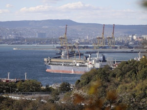 caption: An oil tanker is moored at the Sheskharis complex, part of Chernomortransneft JSC, a subsidiary of Transneft PJSC, in Novorossiysk, Russia, Oct. 11, one of the largest facilities for oil and petroleum products in southern Russia. The deadline is looming for Western allies to agree on a price cap on Russia oil.