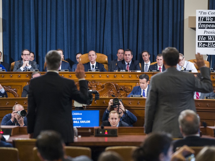 caption: Two witnesses seen as crucial to the case against President Trump in the impeachment inquiry testified Wednesday.