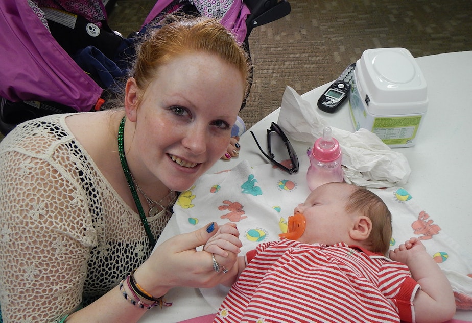 caption: Chelsea Lapointe and her 7-week-old daughter Santa Monica at Bianca's Place shelter in Seattle