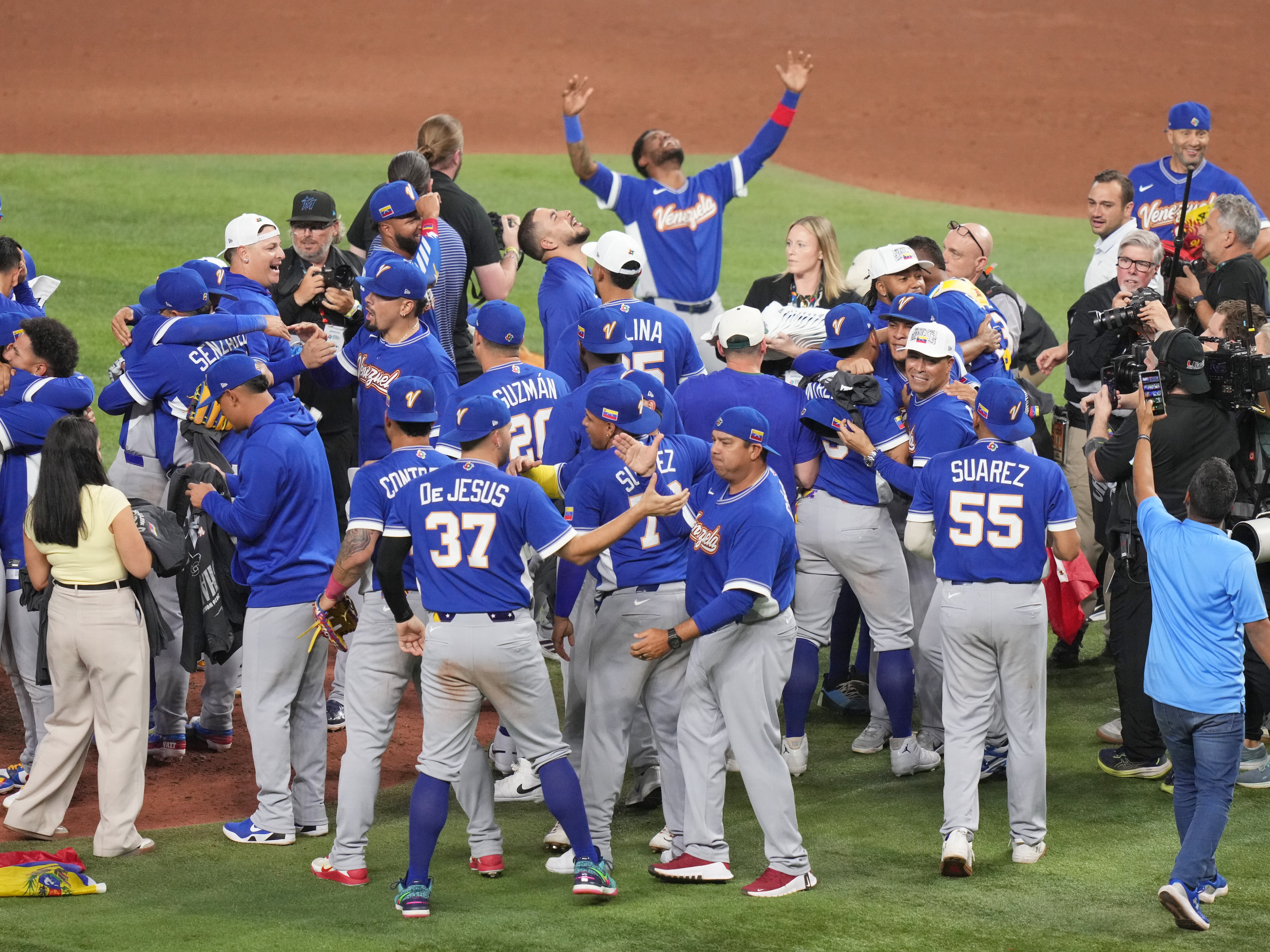 caption: The Venezuela team celebrates after defeating the United States in the championship game of the World Baseball Classic, Tuesday, March 17, 2026, in Miami.