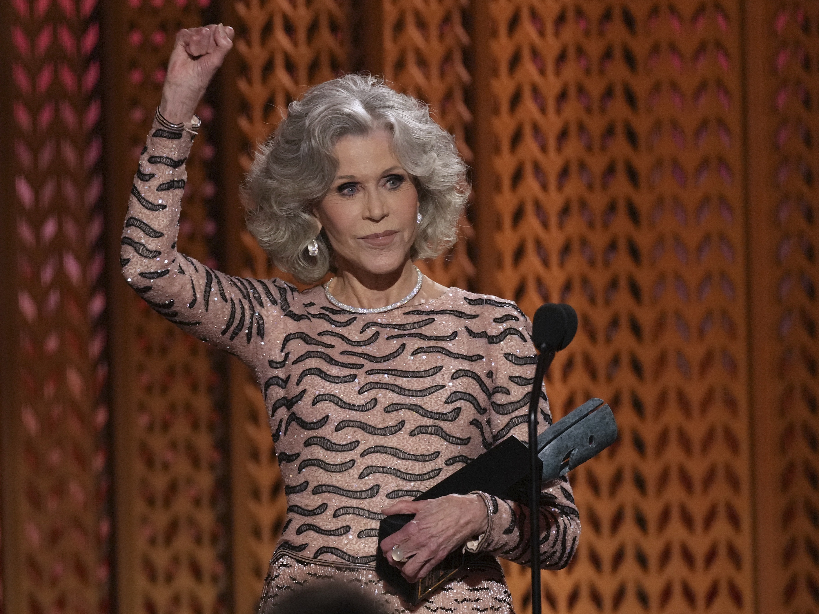 caption: Jane Fonda critiqued the Trump administration during her acceptance speech at the Screen Actors Guild Awards on Feb. 23, 2025.