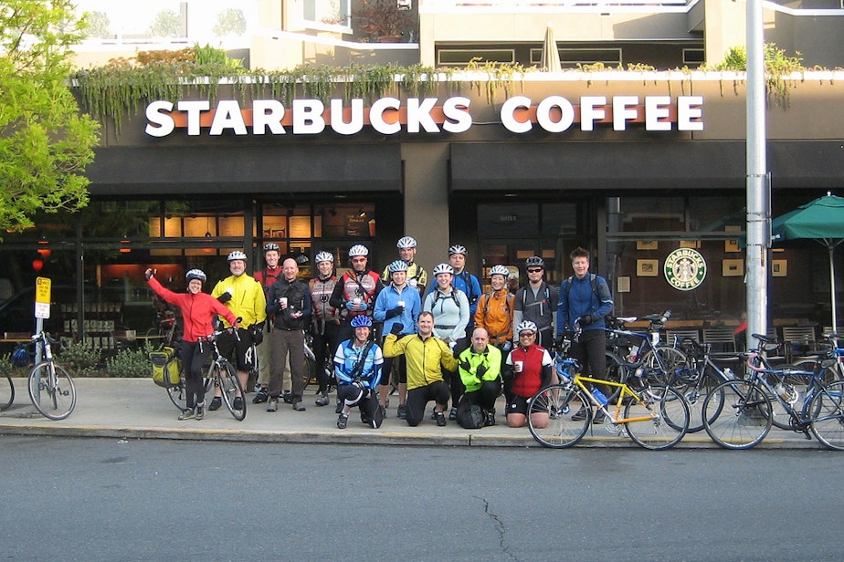 caption: This group of REI employees met at a Starbucks for bike-to-work day. Is there anything more Northwest than that?