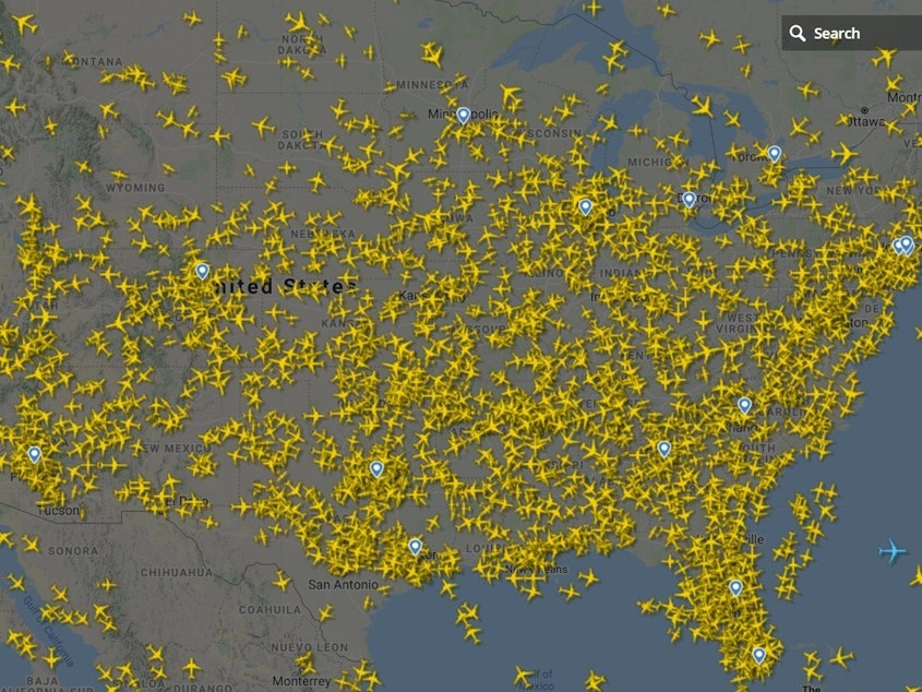caption: With the coronavirus outbreak taking hold in the U.S., thousands of flights have been canceled — but on Sunday, there were still 2,800 planes in the air, according to aviation site Flightradar.com