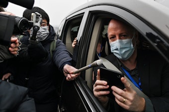 caption: World Health Organization investigative team member Peter Daszak (shown here during a trip to China in February) tells NPR that the group's report calls for additional research on farms that breed exotic animals in southern China.