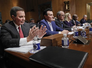 caption: Drug prices in the United States support spending on research and development, said AbbVie CEO Richard Gonzalez (far left) in testimony by drug company executives before the Senate Finance Committee on Tuesday.