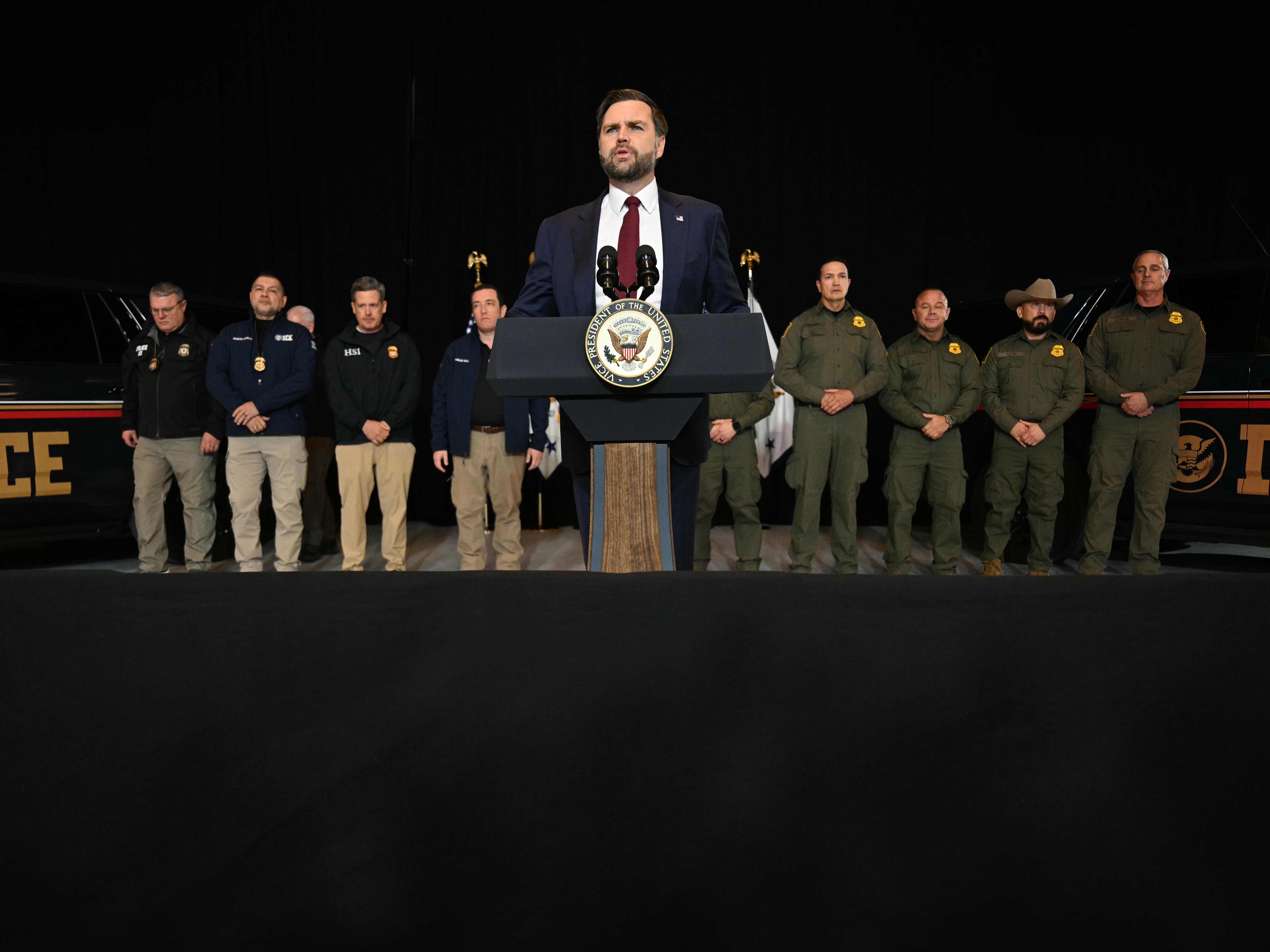 caption: Vice President JD Vance gave remarks while standing in front of ICE agents following a roundtable discussion with local leaders and community members amid a surge of federal immigration authorities in Minneapolis, Minnesota.