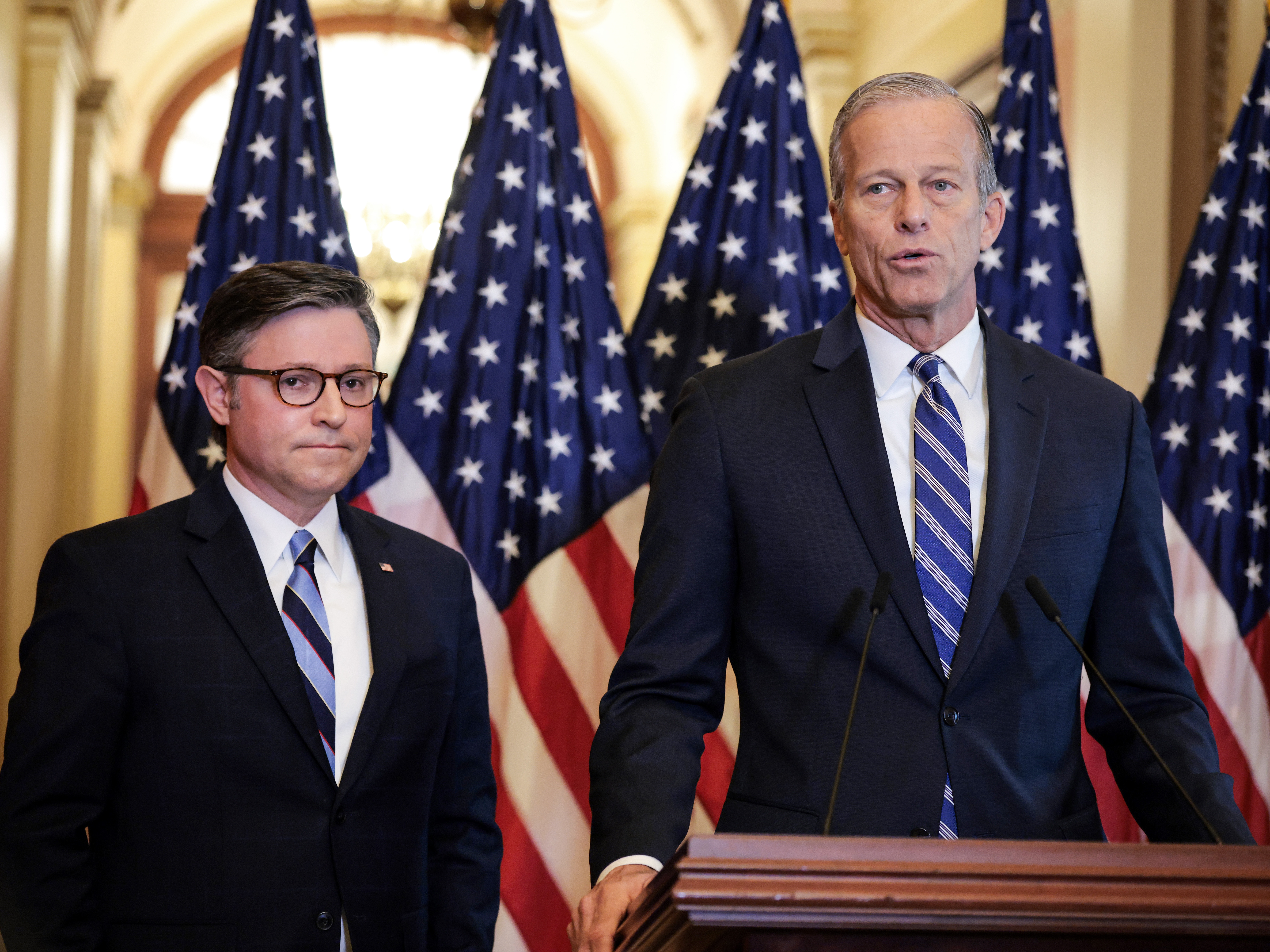 caption: Senate Majority Leader John Thune (R-SD) (R) and Speaker of the House Mike Johnson (R-LA) held a press conference on the Republican budget bill on April 10. (Photo by Kayla Bartkowski/Getty Images)