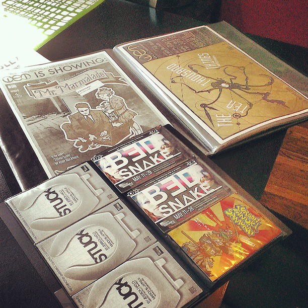 caption: Washington Ensemble Theatre playbills from the past decade.