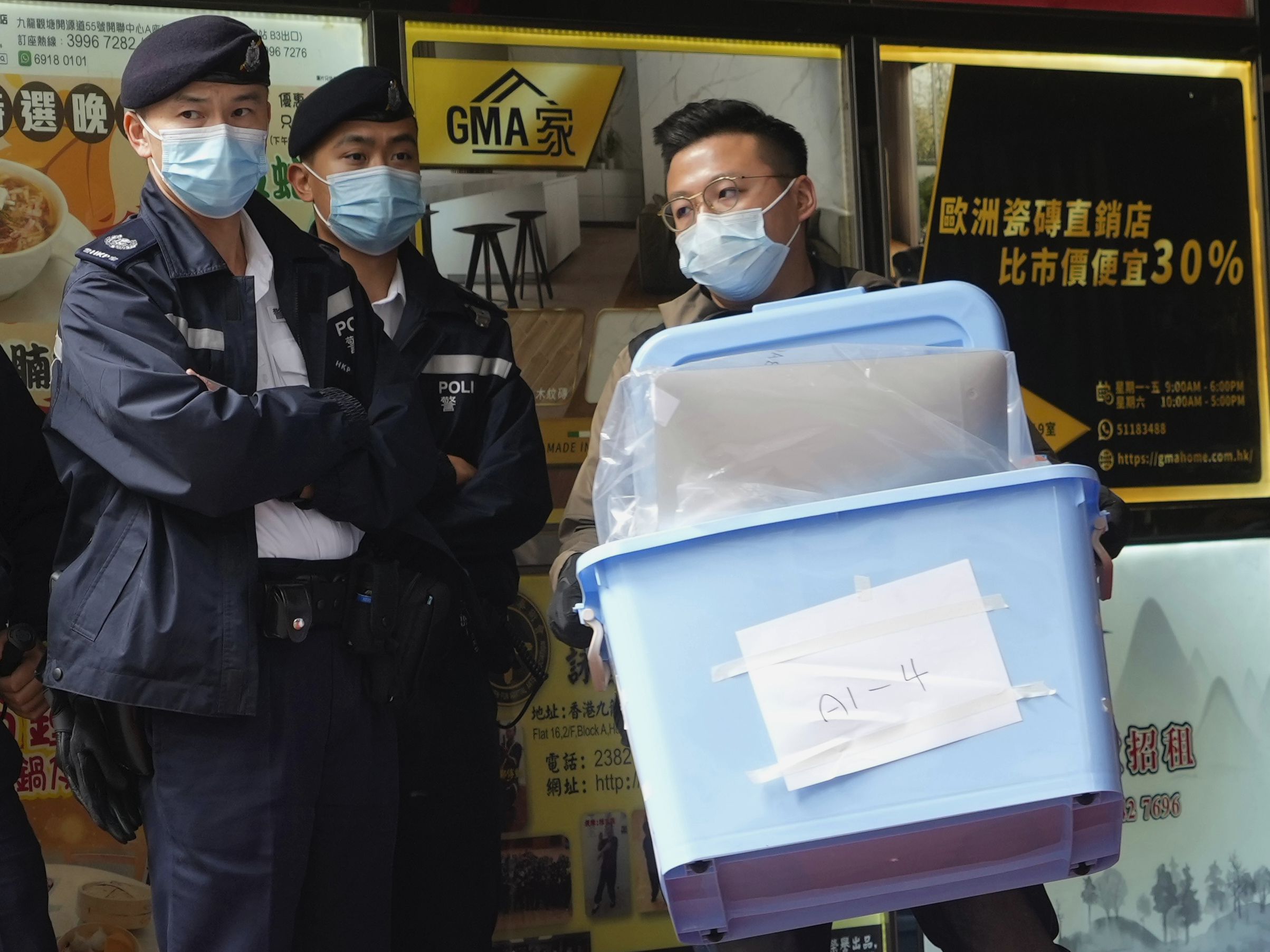 caption: Hong Kong police raided the office of the online news outlet Stand News on Wednesday after arresting several people for conspiracy to publish a seditious publication.  The website shut down hours later.