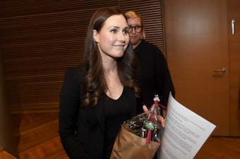 caption: Sanna Marin celebrates after winning her party's prime minister nomination on Sunday. The 34-year-old will be Finland's third female government head.
