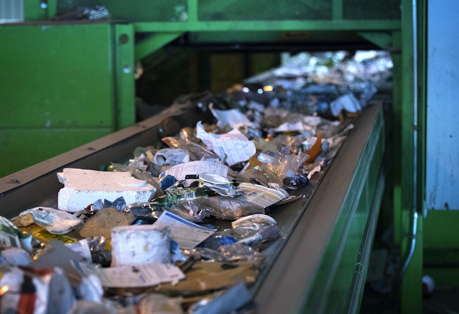 caption: Recycled items are shown before going through the aluminum quality control station at the Recology CleanScapes Materials Recovery Facility on Tuesday, October 31, 2017, in Seattle. 