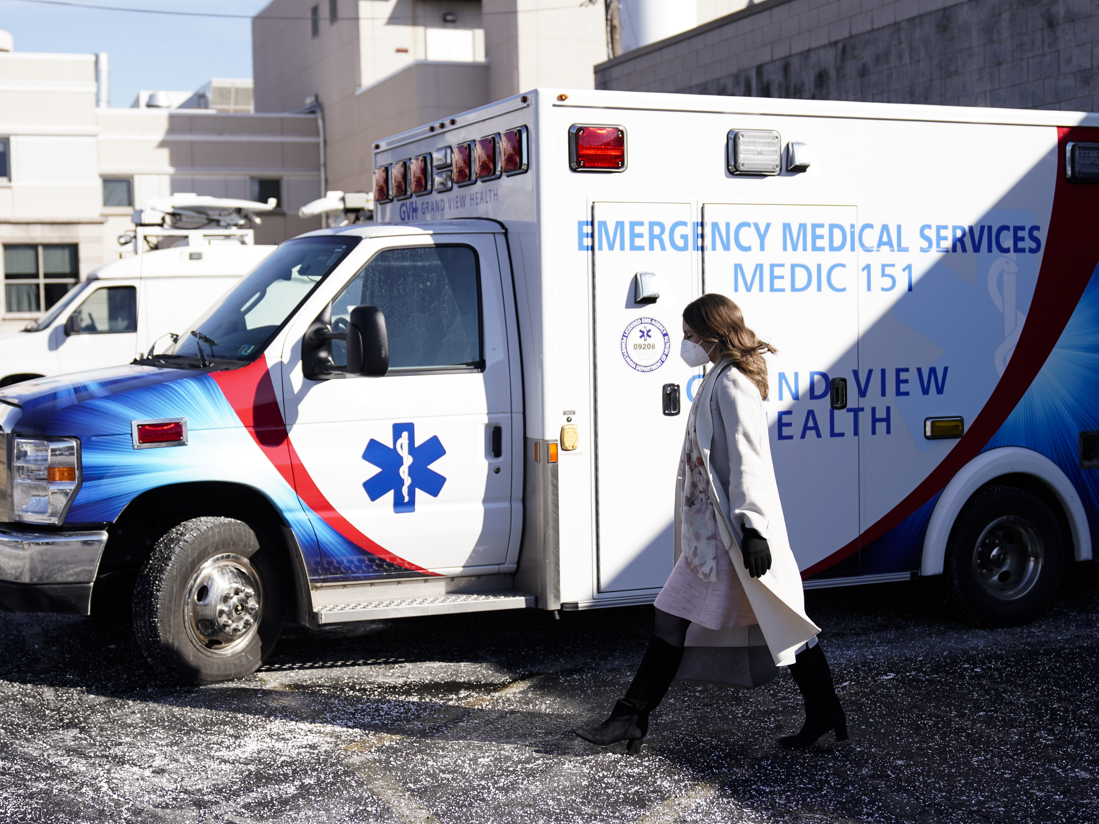 caption: Pennsylvania's acting Secretary of Health Keara Klinepeter walks from a news conference at Grandview Health in Sellersville, Pa., on Jan. 24.