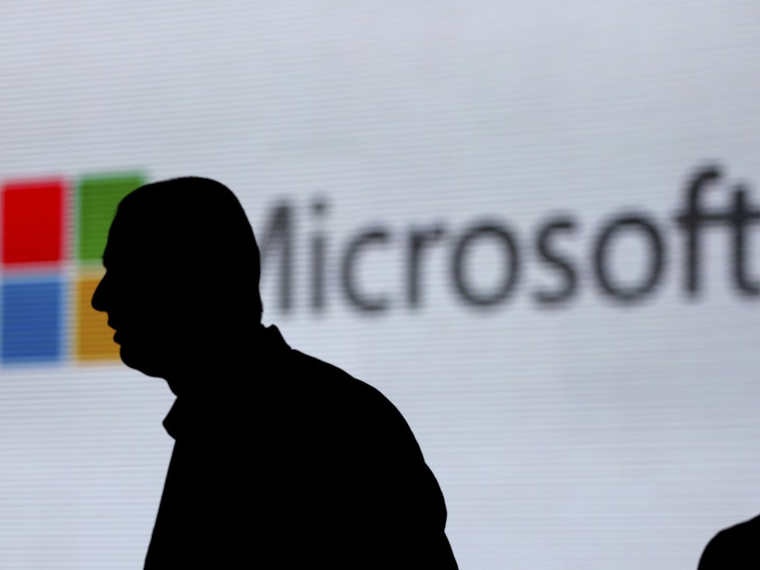 caption: Microsoft President Brad Smith said the hack into IT management firm, SolarWinds, impacted its customers.