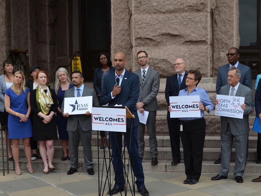 caption: Mike Hollinger of IBM joined a group of business leaders at a news conference on the steps of the capitol in Austin, Texas. The business leaders oppose the so-called religious refusal laws currently under consideration in the Texas legislature.