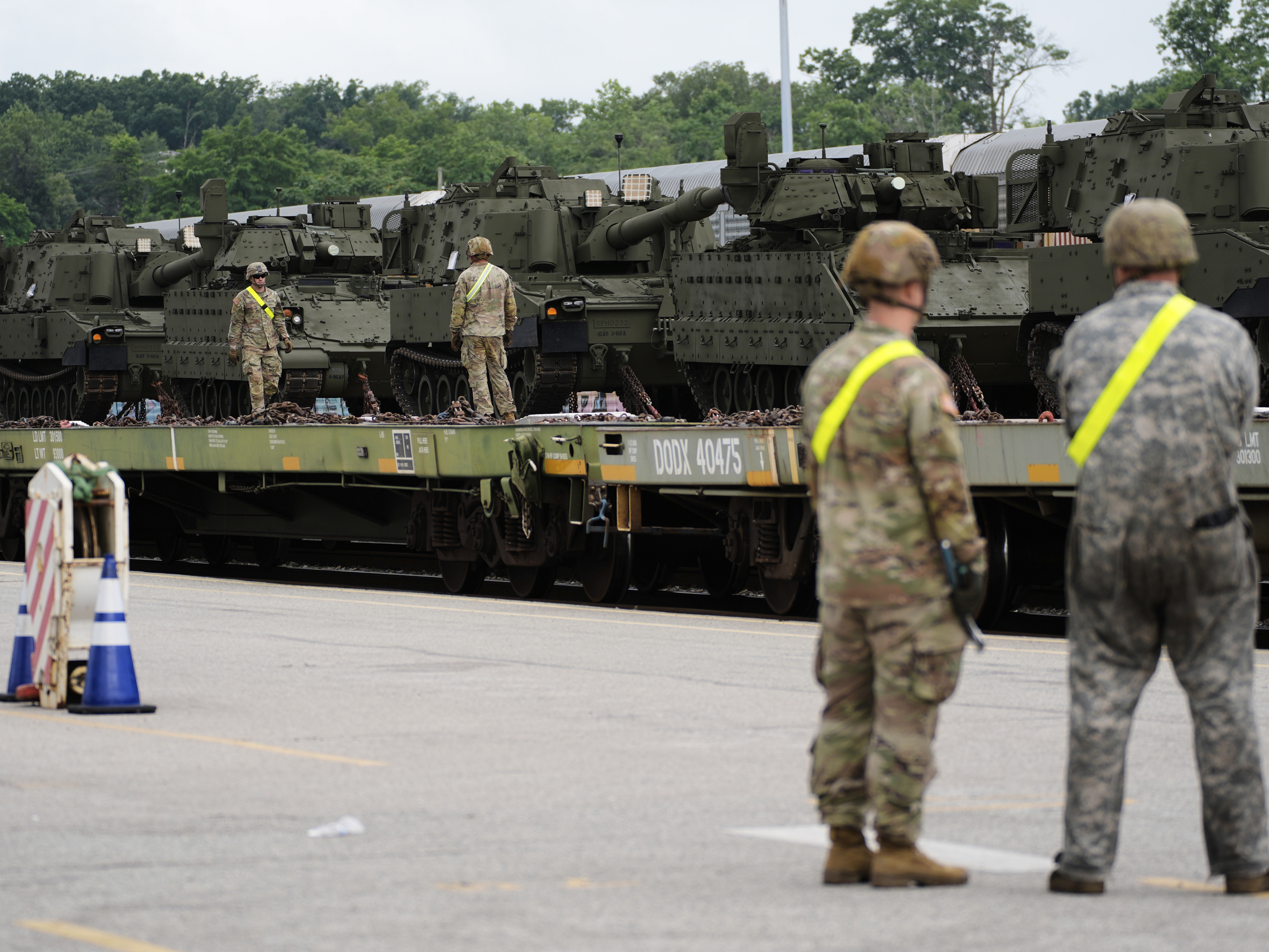 caption: U.S. Army personnel offload tanks and other military vehicles, Monday, June 9, 2025, at the CSX railroad yard in Jessup, Md., ahead of an upcoming military parade commemorating the U.S. Army's 250th anniversary and coinciding with President Donald Trump's 79th birthday.