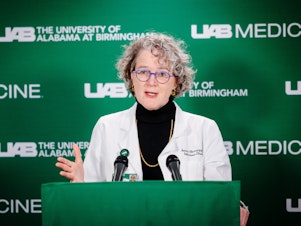 caption: Dr. Jeanne Marrazzo was a clear and down-to-earth explainer of what was happening during the pandemic, often on CNN and other networks. She's pictured here at a COVID press conference in April 2020.