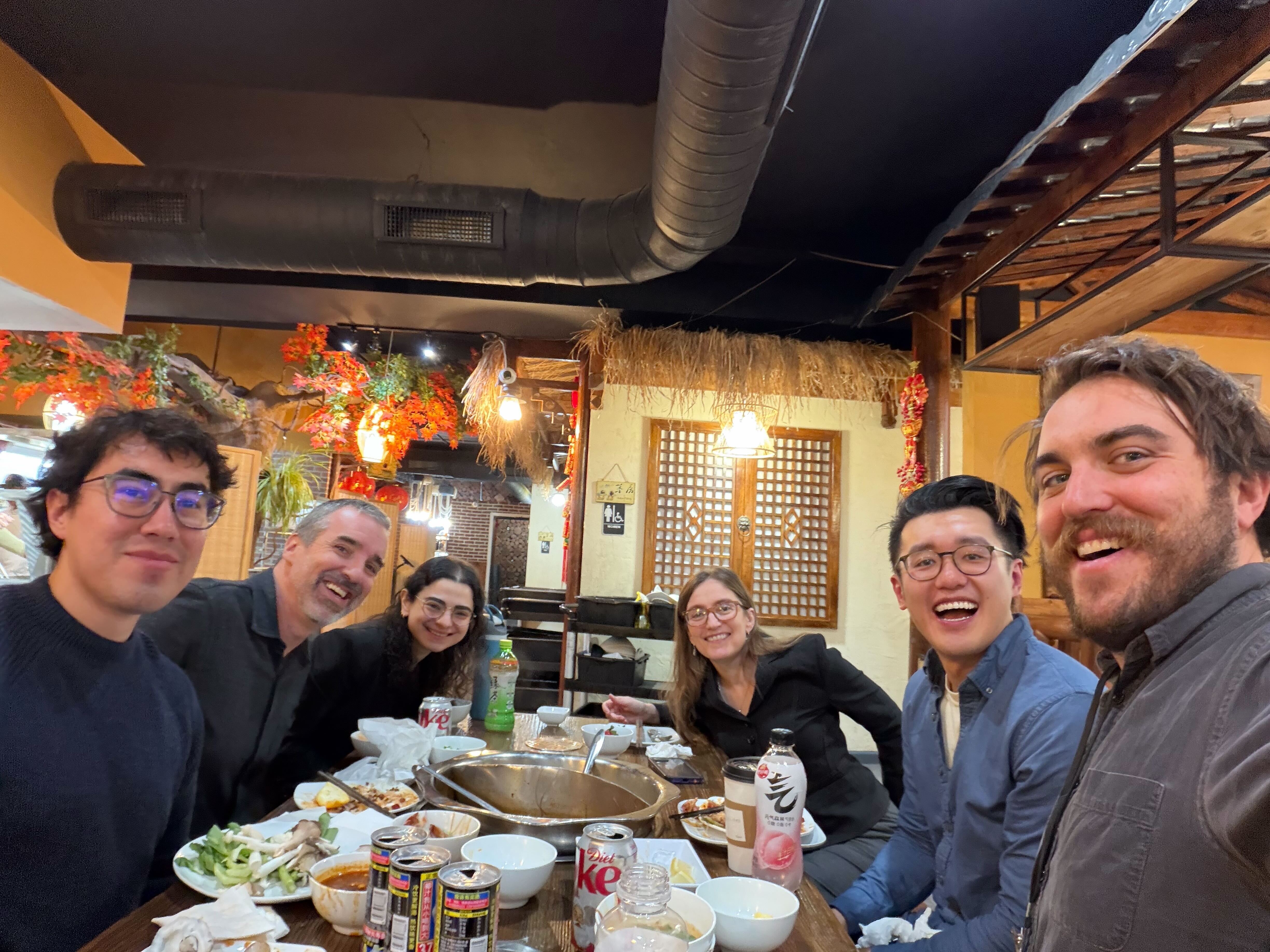 caption: Planet Money staffers at the annual AEA meeting