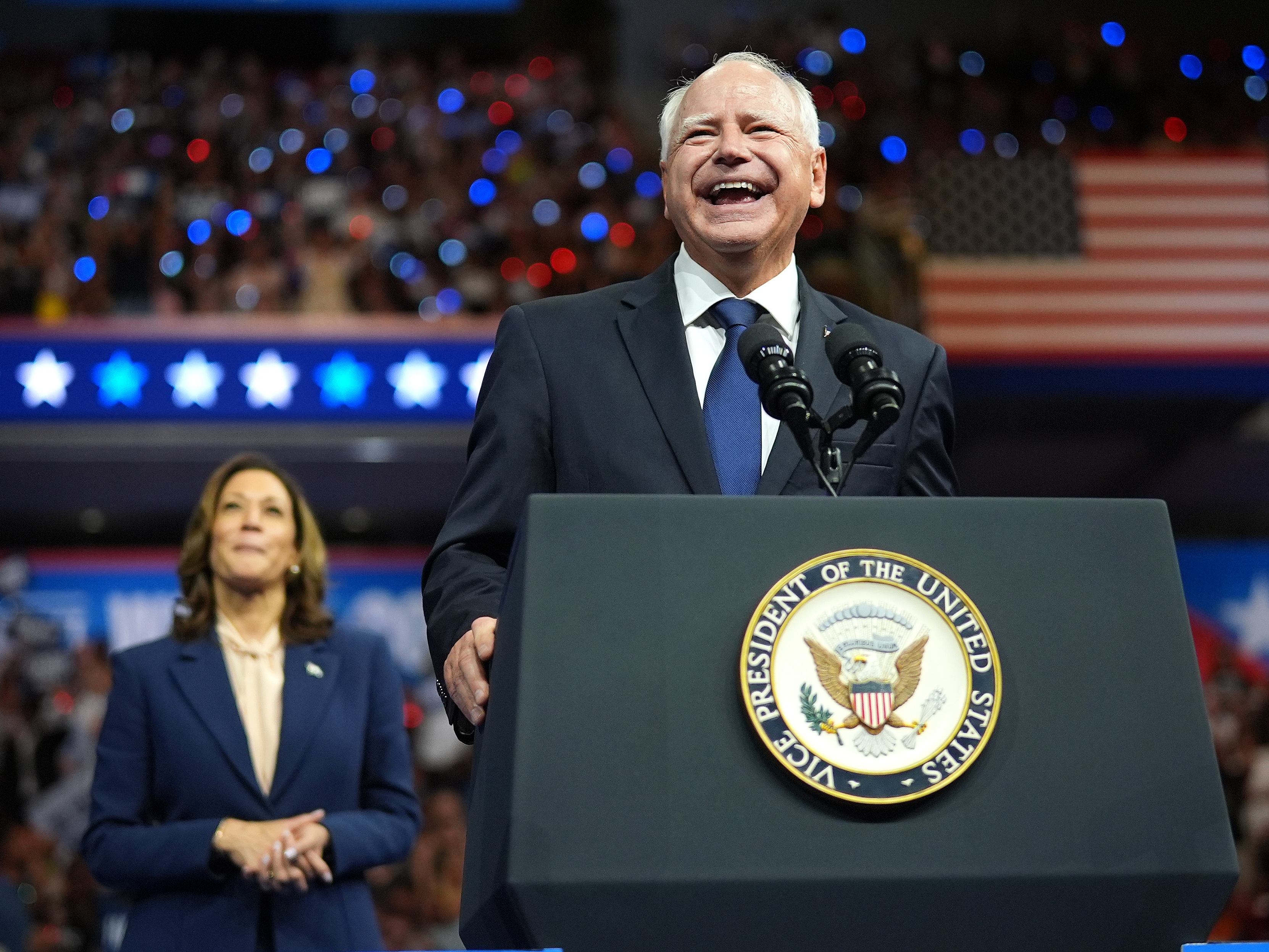 caption: Democratic vice presidential candidate Minnesota Gov. Tim Walz speaks during a campaign rally with Democratic presidential candidate, U.S. Vice President Kamala Harris, at the Liacouras Center at Temple University on Aug. 6, 2024 in Philadelphia.