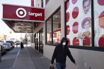 caption: Target said it would raise its minimum wage as high as $24 per hour.
