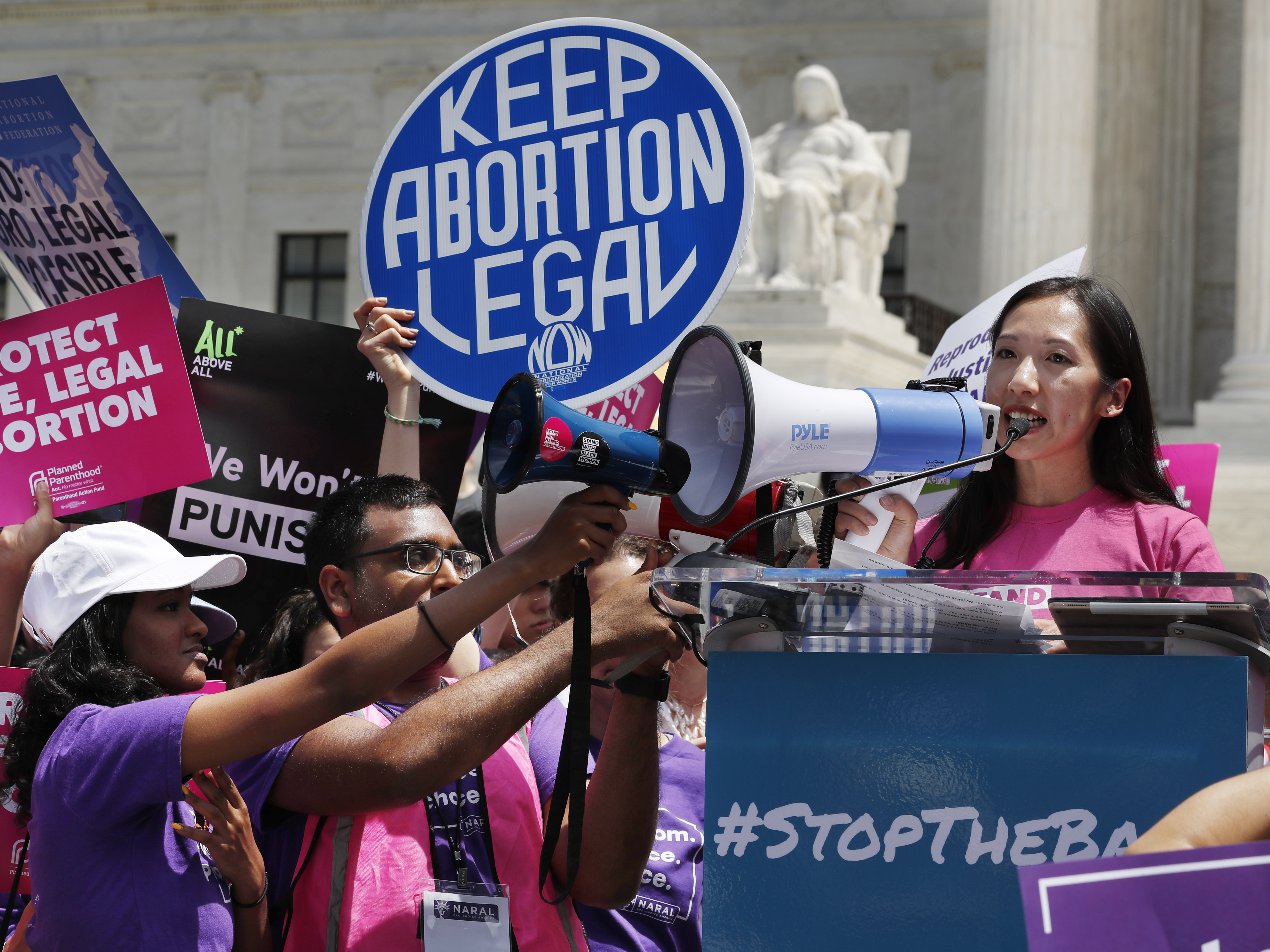 caption: President of Planned Parenthood Leana Wen speaks during a protest against abortion bans on May 21 outside the Supreme Court in Washington.