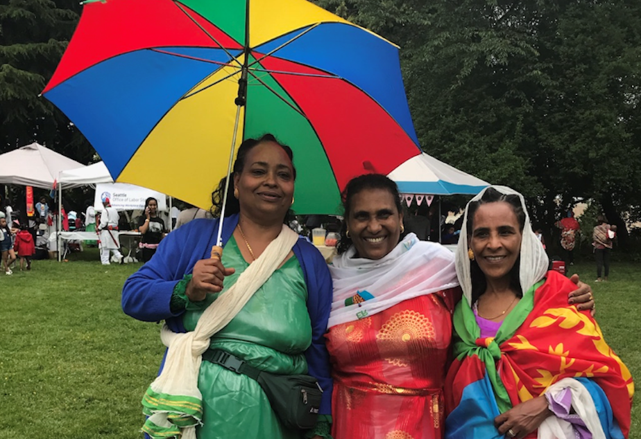 Akberet Asfaha (left) poses with friends at an event to celebrate Eritrea's Day of Independence.